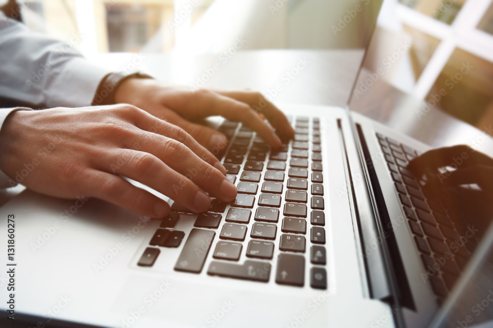 Businessman using laptop, close up Businessman using laptop, close up