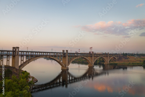 sunset on the Dnieper. Bridge in Zaporozhye, Ukraine