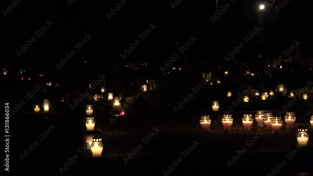 Graveyard decorated with candles for All Saints Day at night. 4K Graveyard decorated with candles for All Saints Day at night. 4K