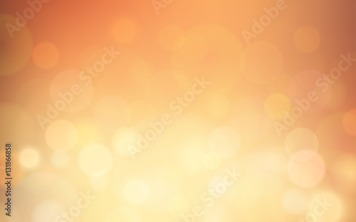 Abstract bokeh and lens flare pattern on summer orange color blurred background (vector)