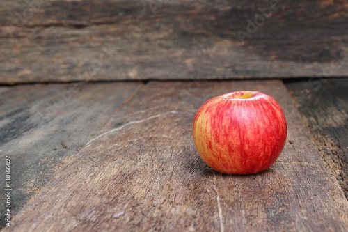 Red Apple Close up on wooden table  background