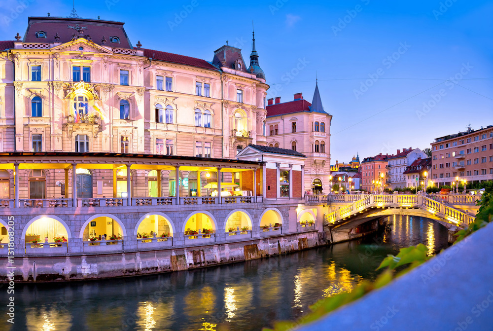 Fototapeta premium Ljubljana riverfront architecture evening view