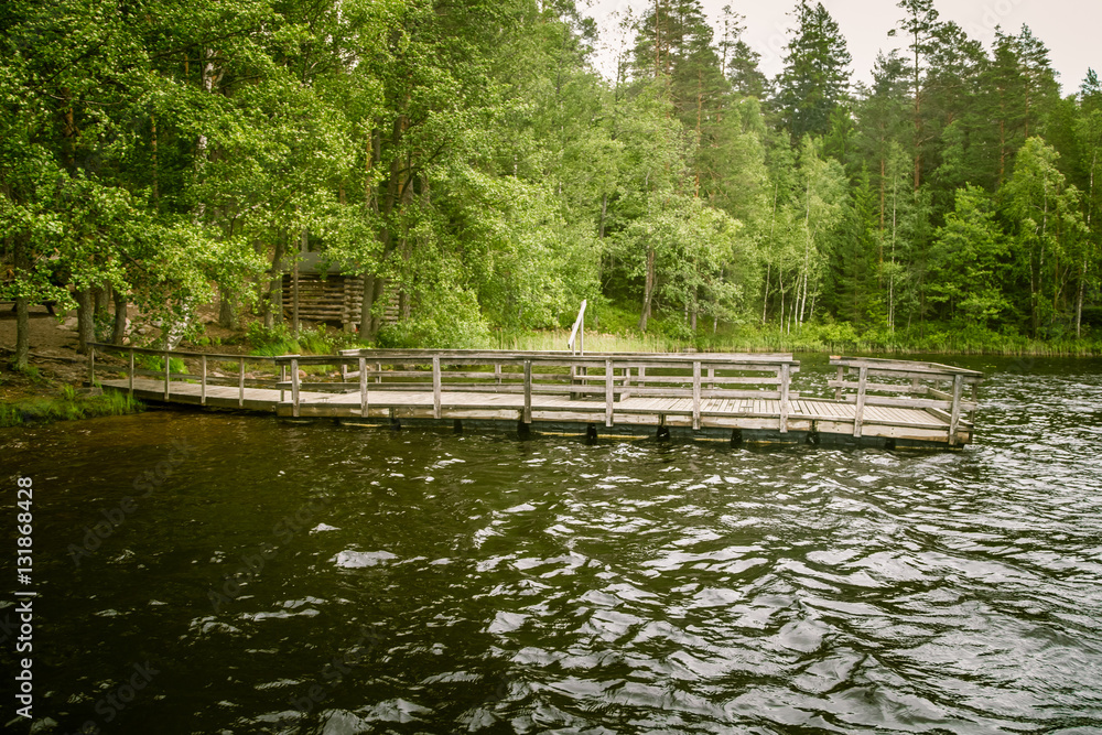 A beautiful lake landscape with footbridge in Finland