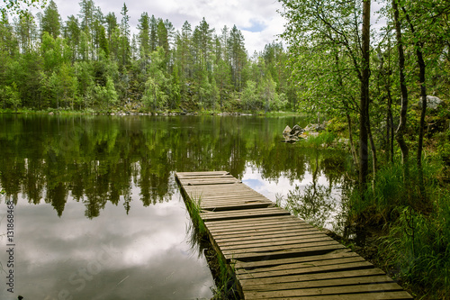 A beautiful lake landscape with footbridge in Finland