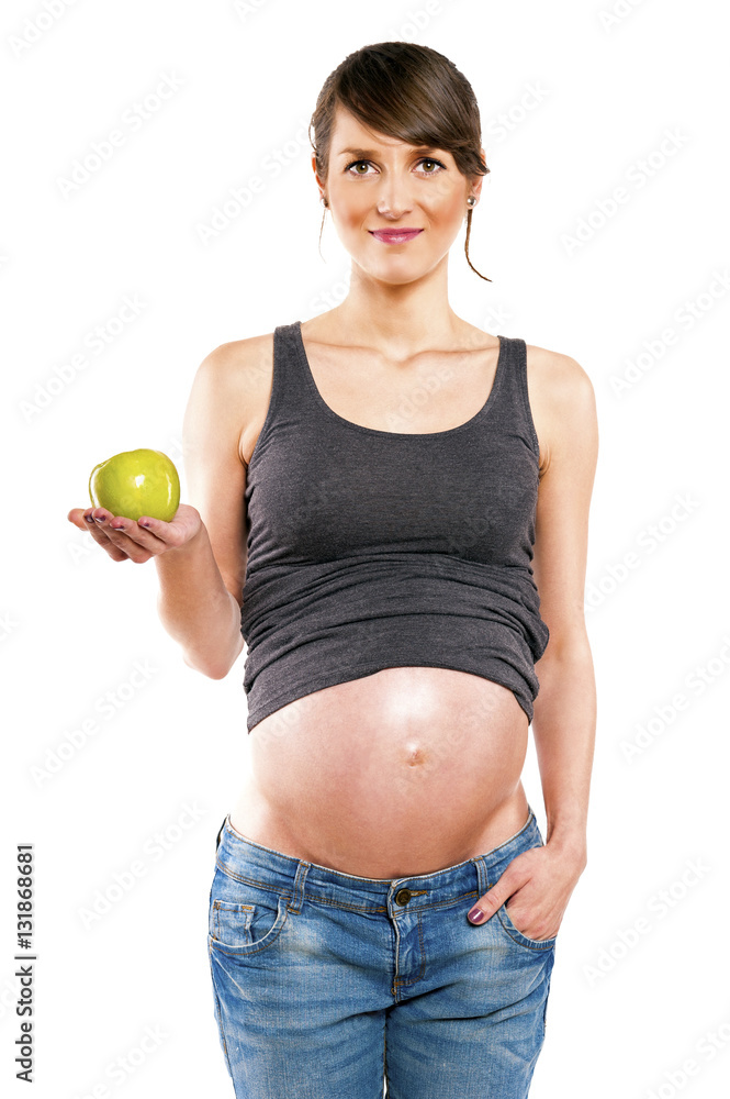 Pregnant woman isolated over white background with apple. Pregnant woman isolated over white background with apple.