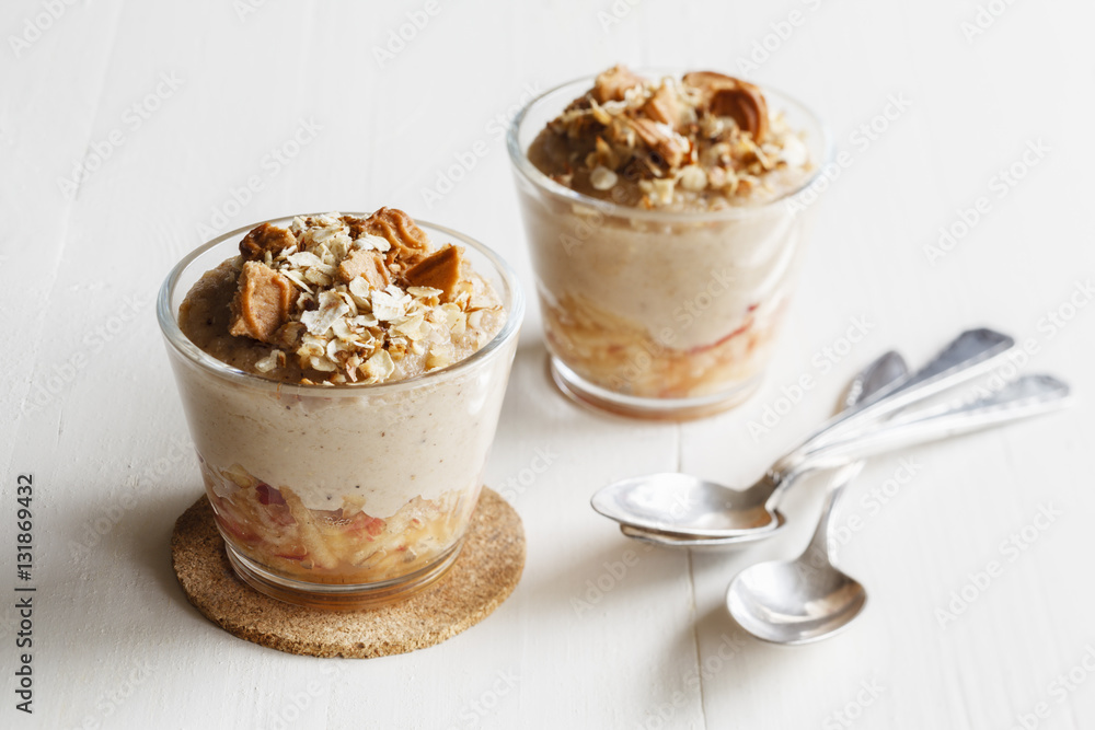 Two glasses of apple cinnamon oat flakes dessert Two glasses of apple cinnamon oat flakes dessert