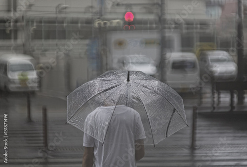 Wall Mural Man with umbrella Tokyo