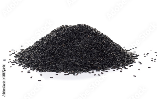 Pile of black sesame seeds isolated on white background