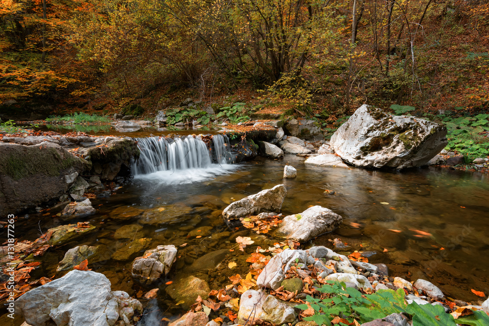 The waterfall near the rock bridge Shapran dupka, the village of Belitsa, Bulgaria