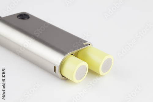 Electronic cigarette with open battery compartment.