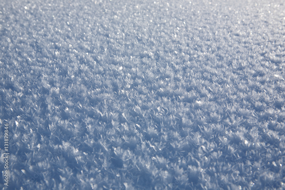 The natural texture of the snow, covered with crystals of frost The natural texture of the snow, covered with crystals of frost