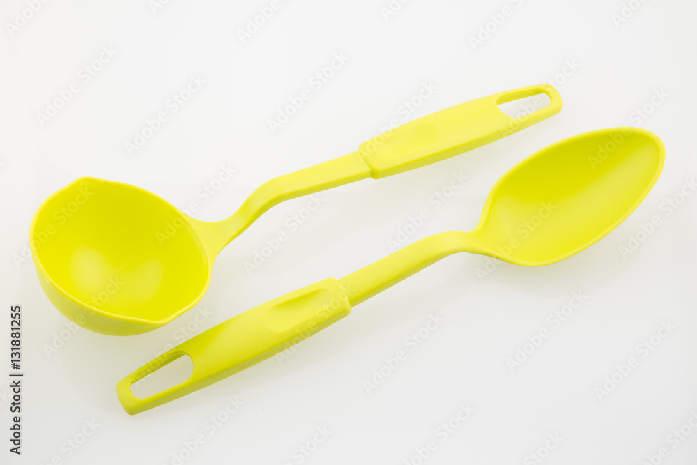 Large plastic spoons on white background Large plastic spoons on white background