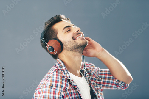 Emotional man with headphon...