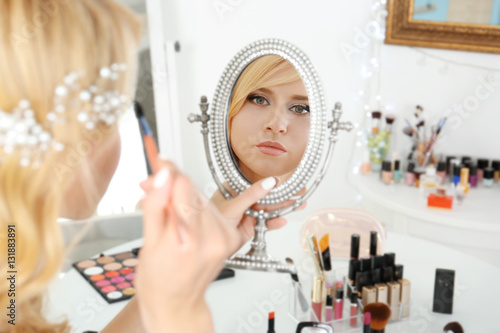 Beautiful young bride looki...