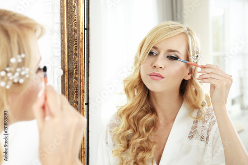 Beautiful young bride looki...