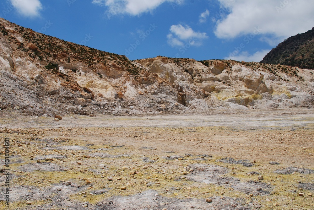 Yellow sulphur on the surface of the Stefanos volcano crater on the Greek island of Nisyros.