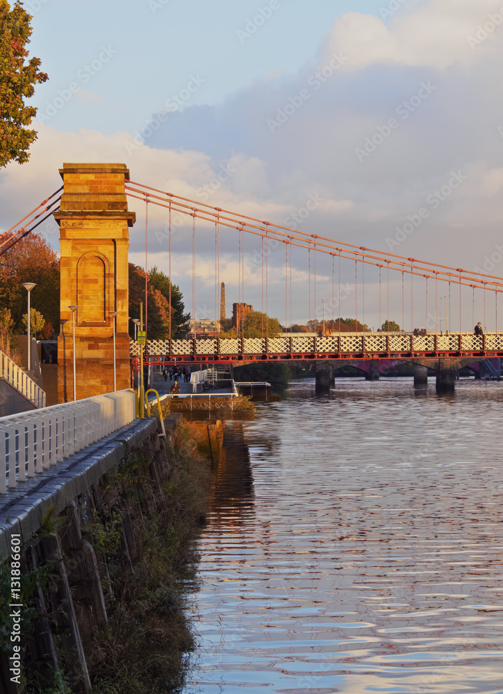 Fototapeta premium UK, Scotland, Glasgow, View of the River Clyde and the Glasgow Suspension Bridge.