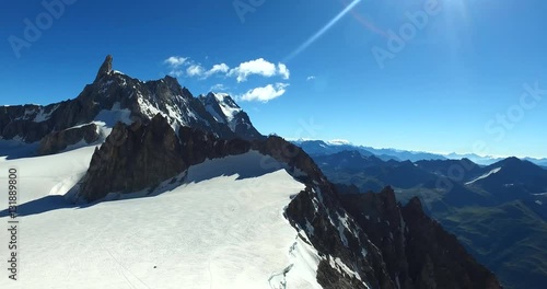 Panoramic view of Western alps whith Mount Blanc and Giant's Tooth (Dent du Geant) from Helbronner roof of europe in Aosta Valley region of Italy