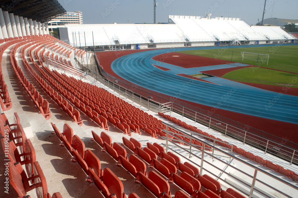 Fototapeta premium Colorful of stadium seats in background.