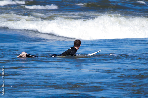 Single surfer waiting for its wave