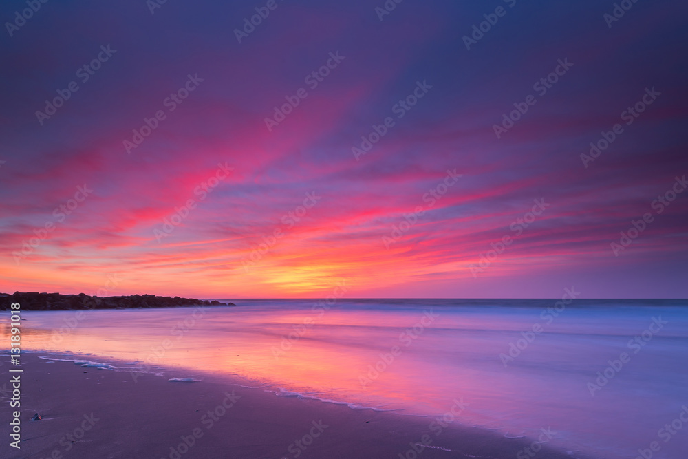 Vibrant sunrise seascape in New Jersey 