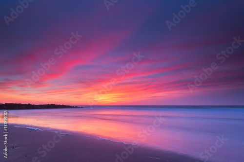 Fototapeta Naklejka Na Ścianę i Meble -  Vibrant sunrise seascape in New Jersey 