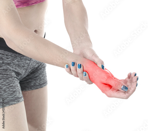 Pain in the wrist. Massage of female wrist.