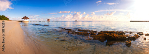 Beautiful sunset over ocean island maldives long panorama photo