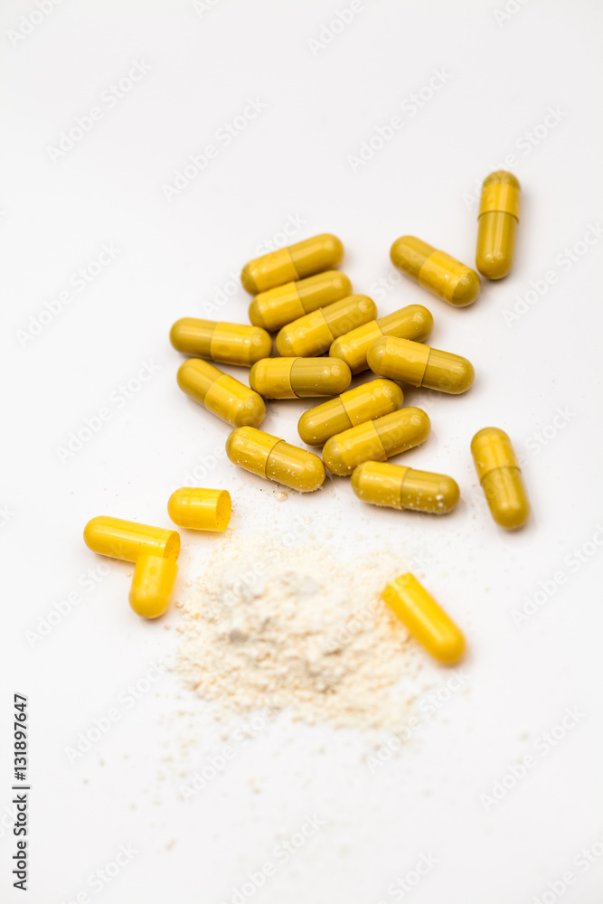 Composition with colorful pills and broken capsules Composition with colorful pills and broken capsules