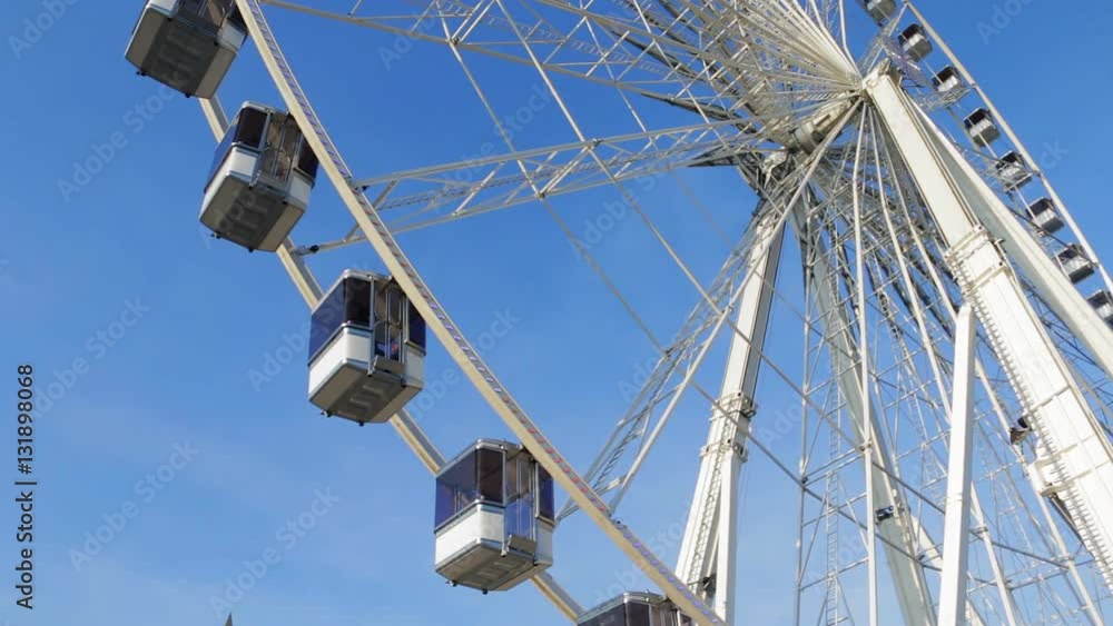 Observation ferris wheel (piece) against the sky. Concept of scale, growth, increase and repeating. Observation ferris wheel (piece) against the sky. Concept of scale, growth, increase and repeating.
