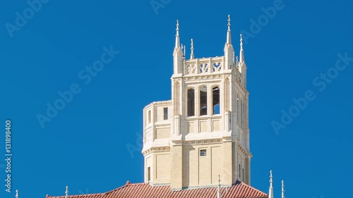 A Building Tower in Asheville NC Showcasing the City's Building Architecture in Front of a Blue Sky Background photo