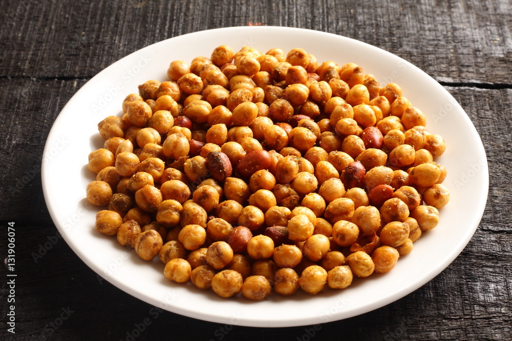 Traditional Indian snack masala chicpes coated with spices Traditional Indian snack masala chicpes coated with spices