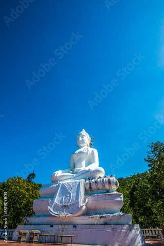 White buddha statue under construction at Phra That Maeyen templ photo