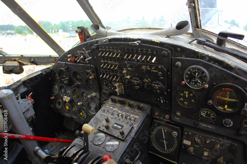 Inside the cockpit of the old plane. Vintage airplane dashboard, close up view
