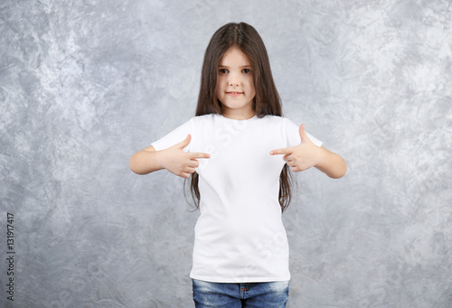 Little girl in blank white ...