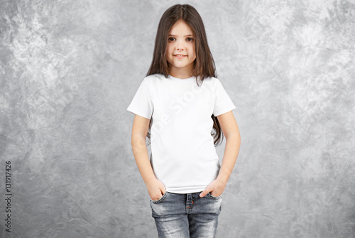 Little girl in blank white ...