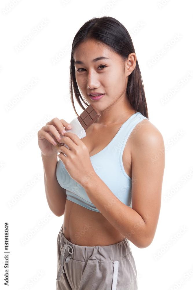 Beautiful healthy Asian girl love chocolate.