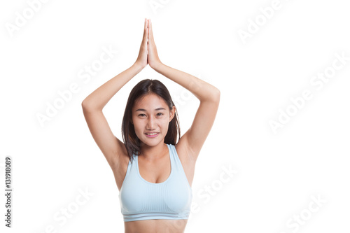 Beautiful Asian healthy girl do yoga pose. © halfbottle