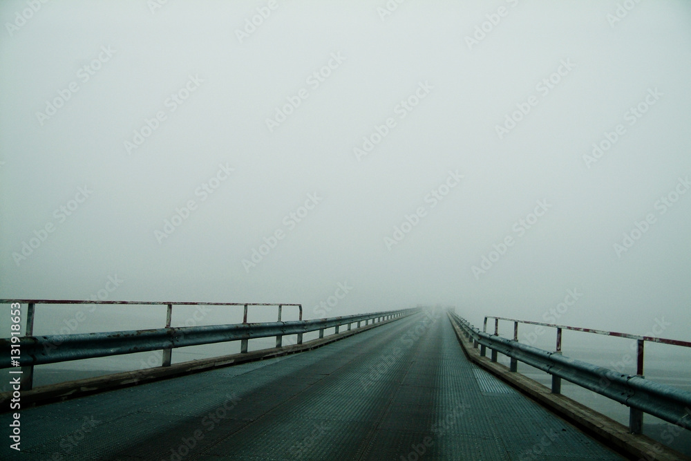 Foggy road on the middle of nothing