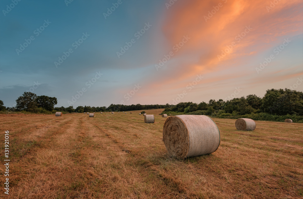 Sunset around bales of hay in the summer, near Burgas city, Bulgaria