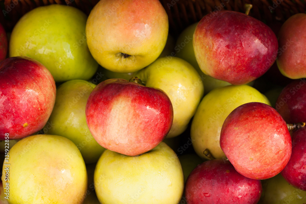 Fresh Apples. Ripe Wet Yellow And Red Apples In Wicker Basket. Top View And Close Up. Healthy Food. Fresh Apples. Ripe Wet Yellow And Red Apples In Wicker Basket. Top View And Close Up. Healthy Food.