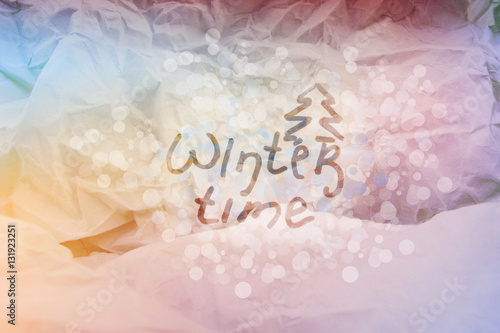 Winter time. Paper color texture. Bokeh background.