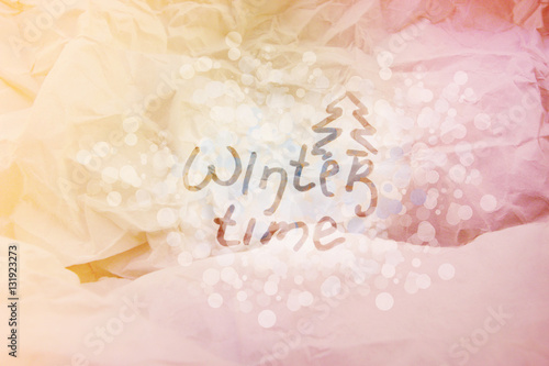 Winter time. Paper color texture. Bokeh background.