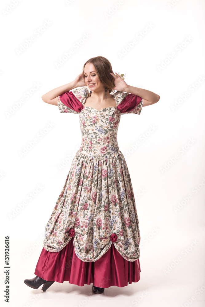 girl on a white background in a long dress