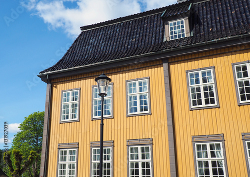 Yellow painted wooden house in Norway