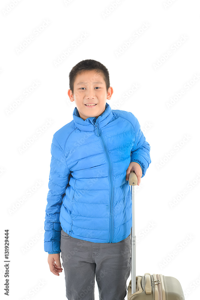 Happy Asian boy wearing blue down jacket with a suitcase. Isolat Happy Asian boy wearing blue down jacket with a suitcase. Isolat