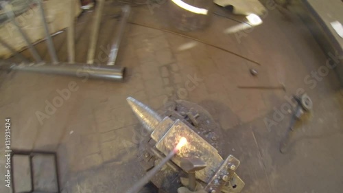 Wallpaper Mural Forging hot metal in smith. Shot taken from camera on head Torontodigital.ca