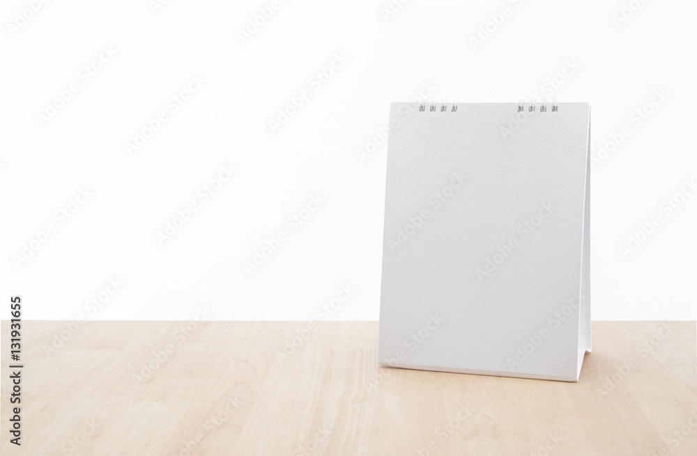 blank calendar planner on wood desk office. blank calendar planner on wood desk office.