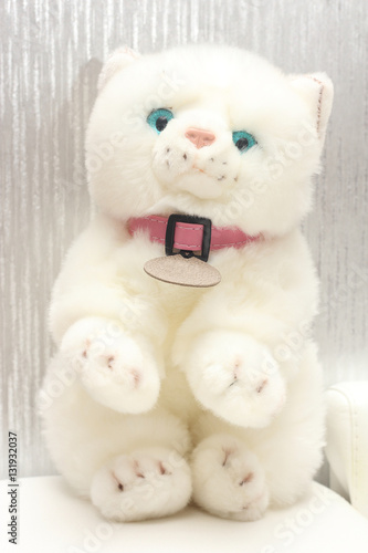 Soft toy fluffy soft white kitty.