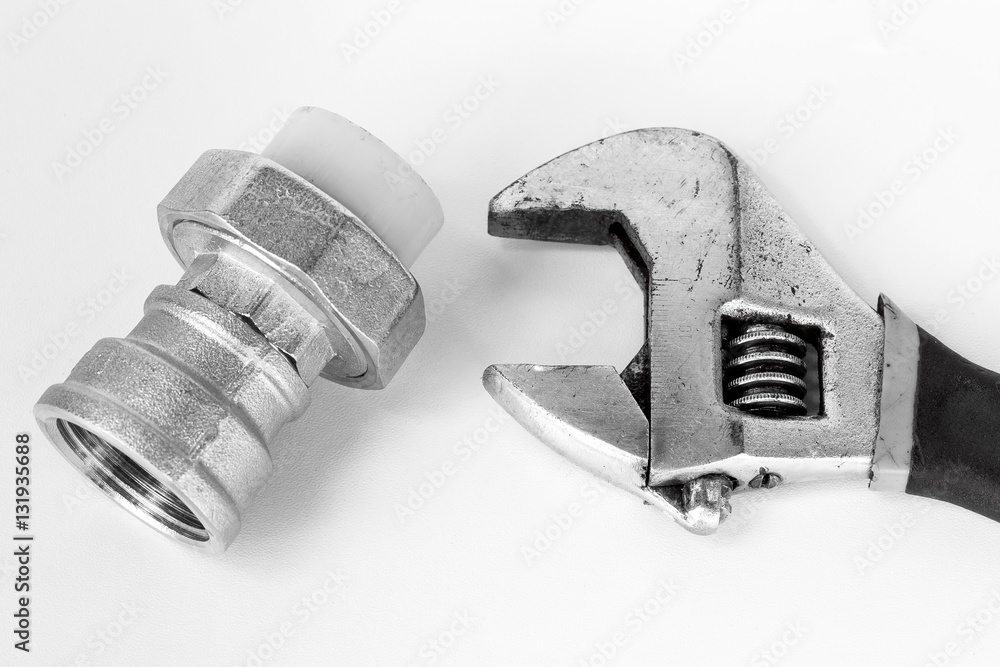 adjustable spanner and fitting for plastic pipes. adjustable spanner and fitting for plastic pipes.